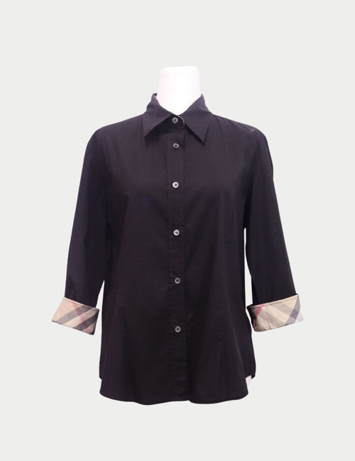 Burberry black button-up shirt with long sleeves and signature check cuff lining
