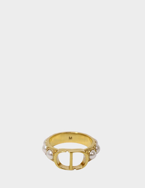 Christian Dior gold-tone ring with central CD logo, faux pearls, and crystal accents