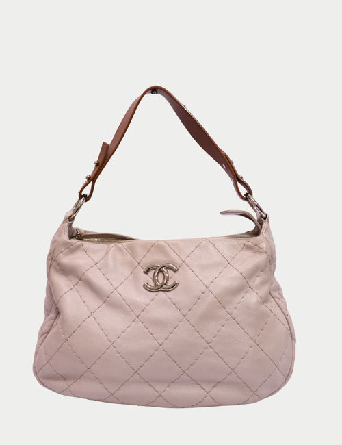 Chanel beige quilted hobo shoulder bag with silver CC logo and brown strap