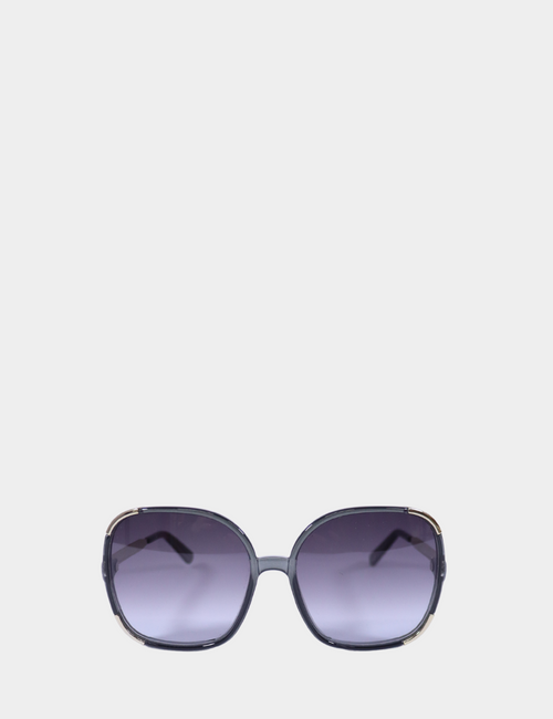 "Chloé oversized square sunglasses with smoky grey frame and gradient lenses, displayed on white background."