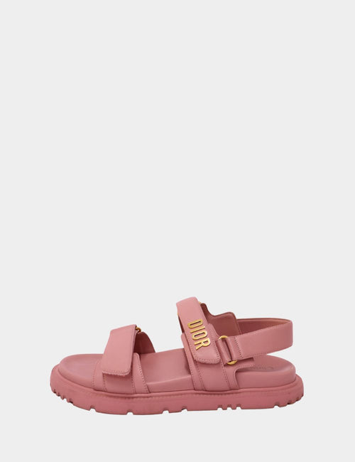 Christian Dior pink rubber sandals with gold logo strap and velcro closure