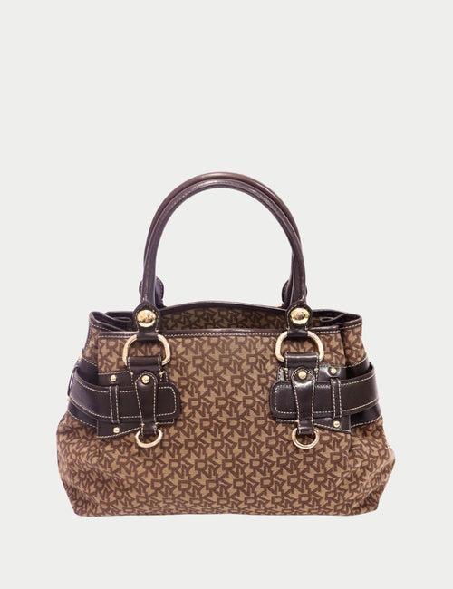 DKNY brown monogram satchel with leather strap detailing and gold hardware