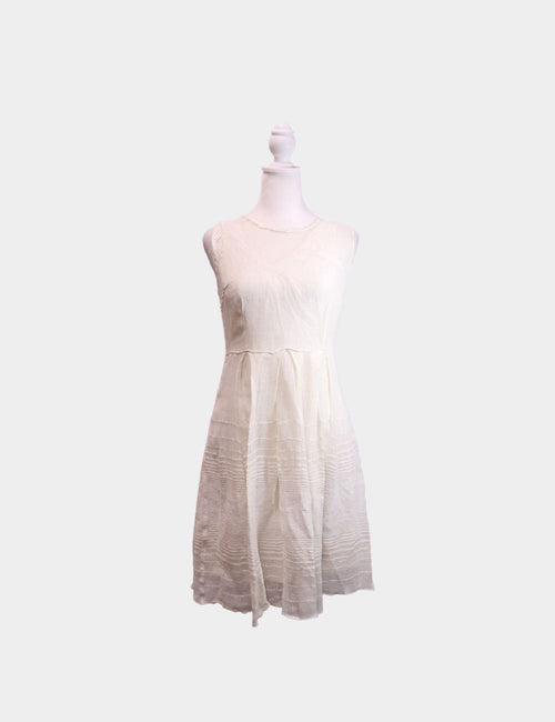 Elie Tahari ivory sleeveless A-line dress with textured stripes and pleated skirt