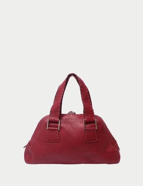 Fendi burgundy leather handbag with contrast stitching, structured top handles, and buckle strap accents