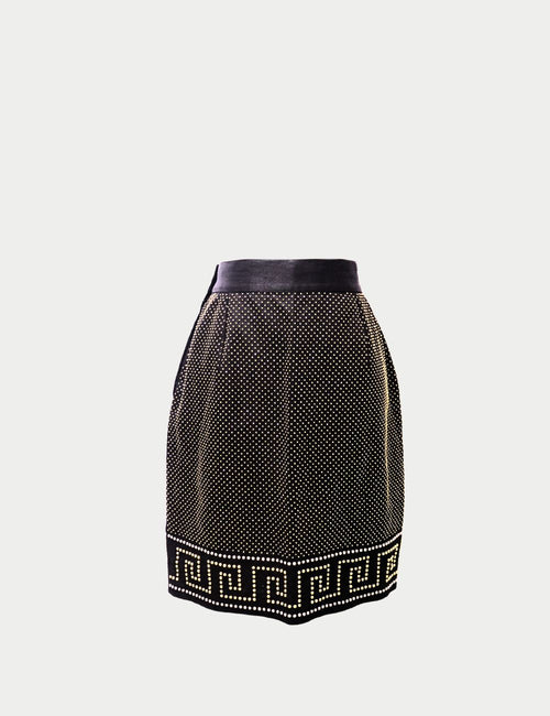 Gianni Versace black high-waisted mini skirt with gold stud embellishments and Greek key hemline pattern