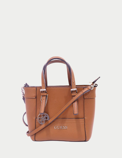 Guess camel mini tote bag with top handles, crossbody strap, and silver-tone logo charm.