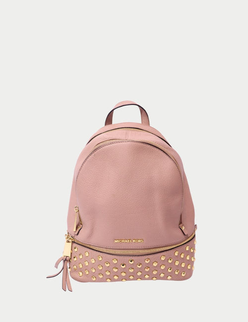 Michael Kors pink leather backpack with gold-tone stud embellishments and front zip pocket