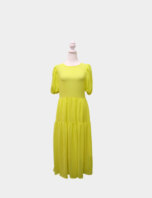 Never Fully Dressed yellow midi dress with puff sleeves and tiered skirt on mannequin