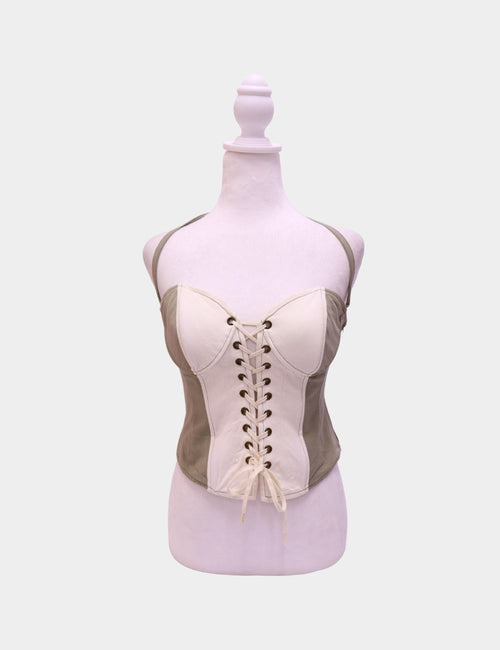 Two-tone neutral lace-up corset top with structured cups and adjustable front lacing.