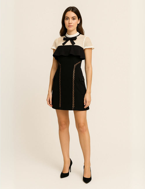 Preowned Self-Portrait black mini dress with white mesh top and black bow neckline – Fashion House designer resale