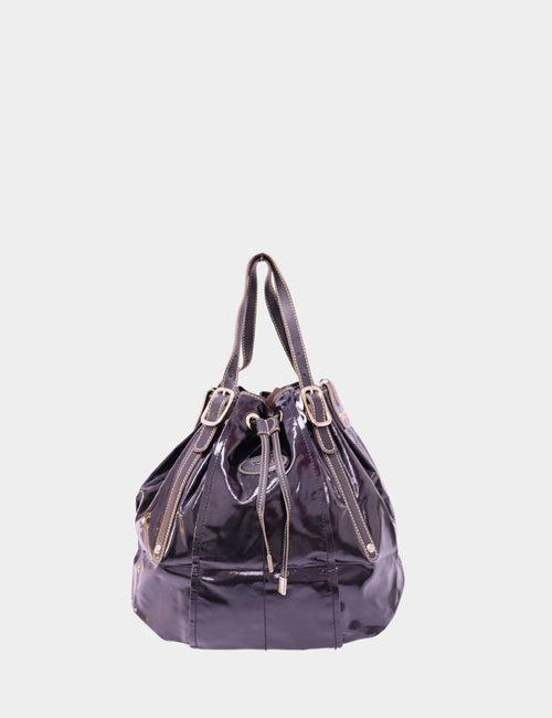 Tod’s black patent leather bucket bag with drawstring closure and gold-tone buckles