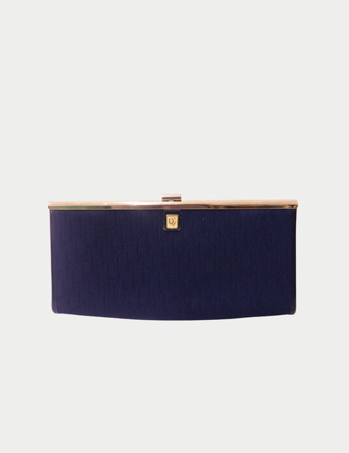 Vintage Christian Dior navy blue monogram clutch with gold metal frame and logo clasp