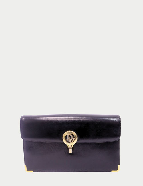 Vintage Christian Dior navy leather clutch with gold CD logo clasp and corner accents