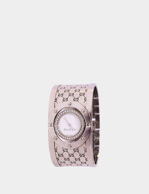 Gucci stainless steel Twirl bangle watch with diamond bezel and GG monogram engraving