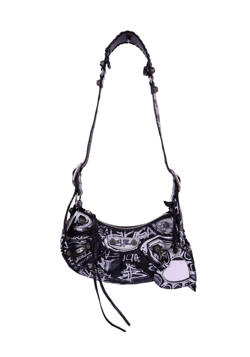Balenciaga Le Cagole mini shoulder bag in black and white graffiti print with studs and mirror charm