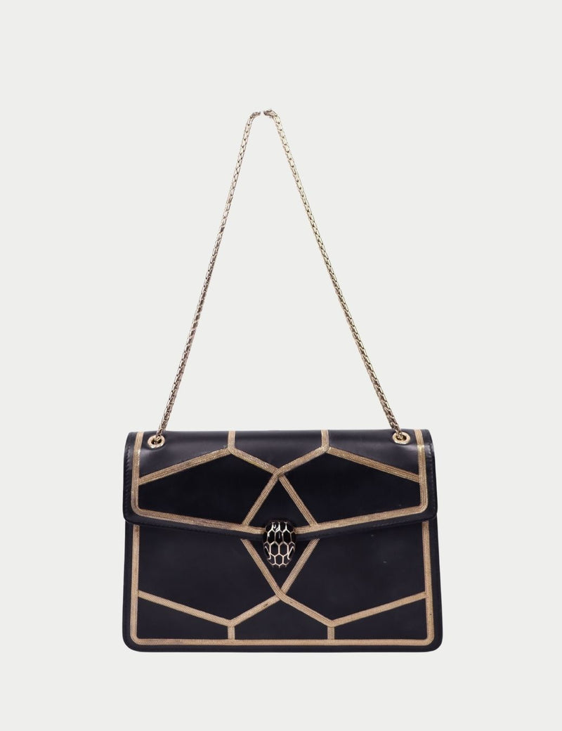 Givenchy black leather long wallet with embossed logo, flap closure, and contrast stitching