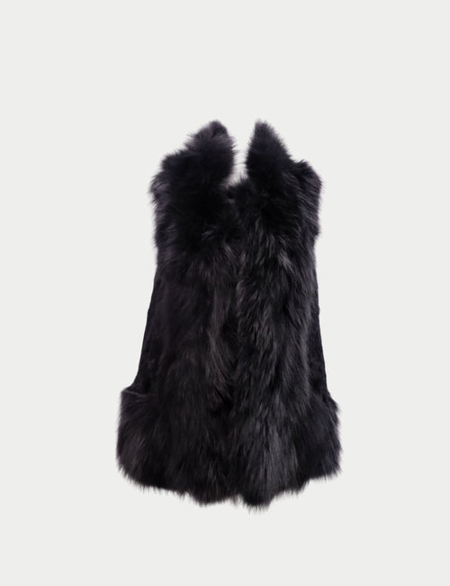 Black fox fur vest with voluminous texture and sleek satin lining