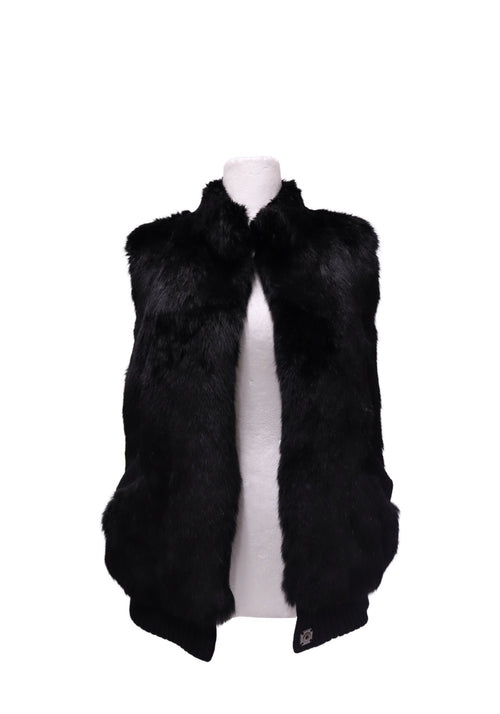 Inès & Maréchal black sleeveless fur vest featuring a plush fur exterior, raised collar, oversized front pockets and ribbed knit hem detailing