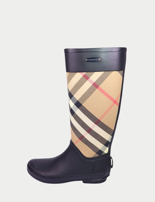 Black Burberry rain boots with signature check panel and flat sole