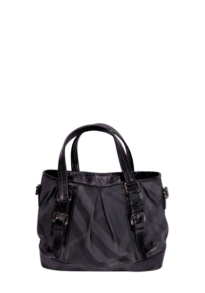 Burberry black Nova Check nylon tote bag with patent leather trim, buckle details, and dual top handles.