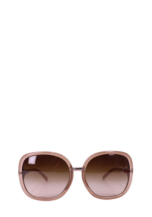 Burberry oversized blush pink sunglasses with gradient brown lenses and rounded square frames.