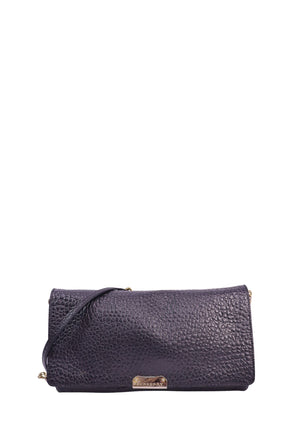 Burberry black grained leather flap crossbody bag with gold-tone logo plaque and adjustable shoulder strap.