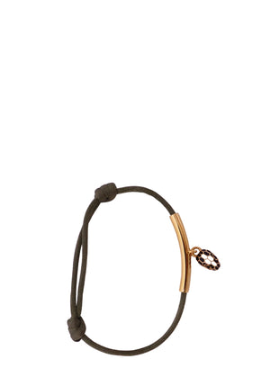 Authentic Bvlgari olive green adjustable cord bracelet featuring a polished yellow gold bar and iconic Serpenti charm