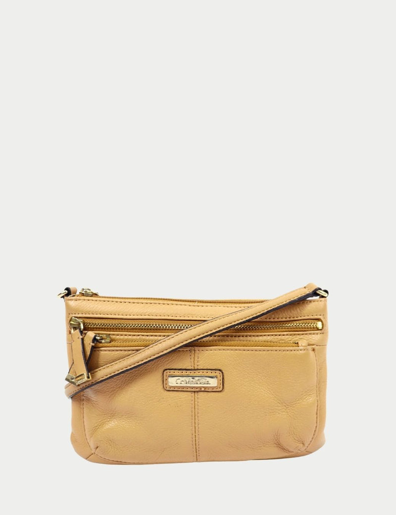 Calvin Klein tan leather crossbody bag with zip pockets