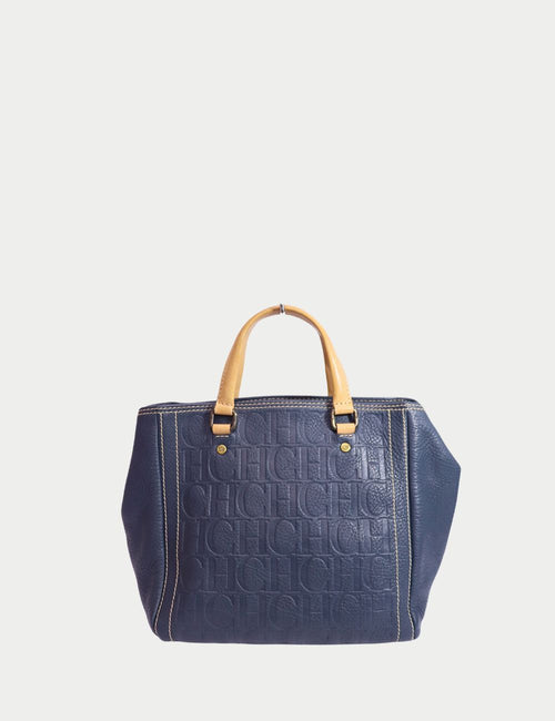 Carolina Herrera navy blue leather tote bag with embossed CH monogram and tan top handles
