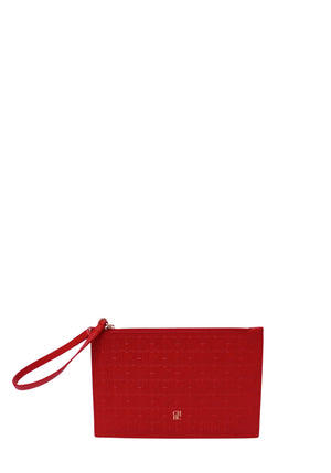 Authentic Carolina Herrera red leather wristlet pouch featuring an embossed CH monogram pattern, zip-top closure, detachable wrist strap, and silver-tone logo