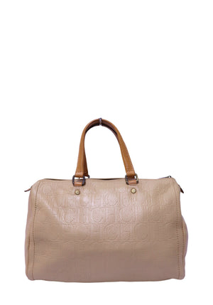 Carolina Herrera cream embossed CH monogram leather bowling bag with tan leather rolled handles and zip-top closure.