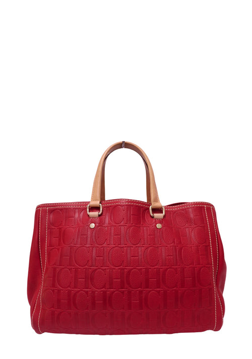 Carolina Herrera red leather tote bag featuring all-over embossed CH monogram, tan leather top handles, contrasting cream stitching and gold-tone hardware
