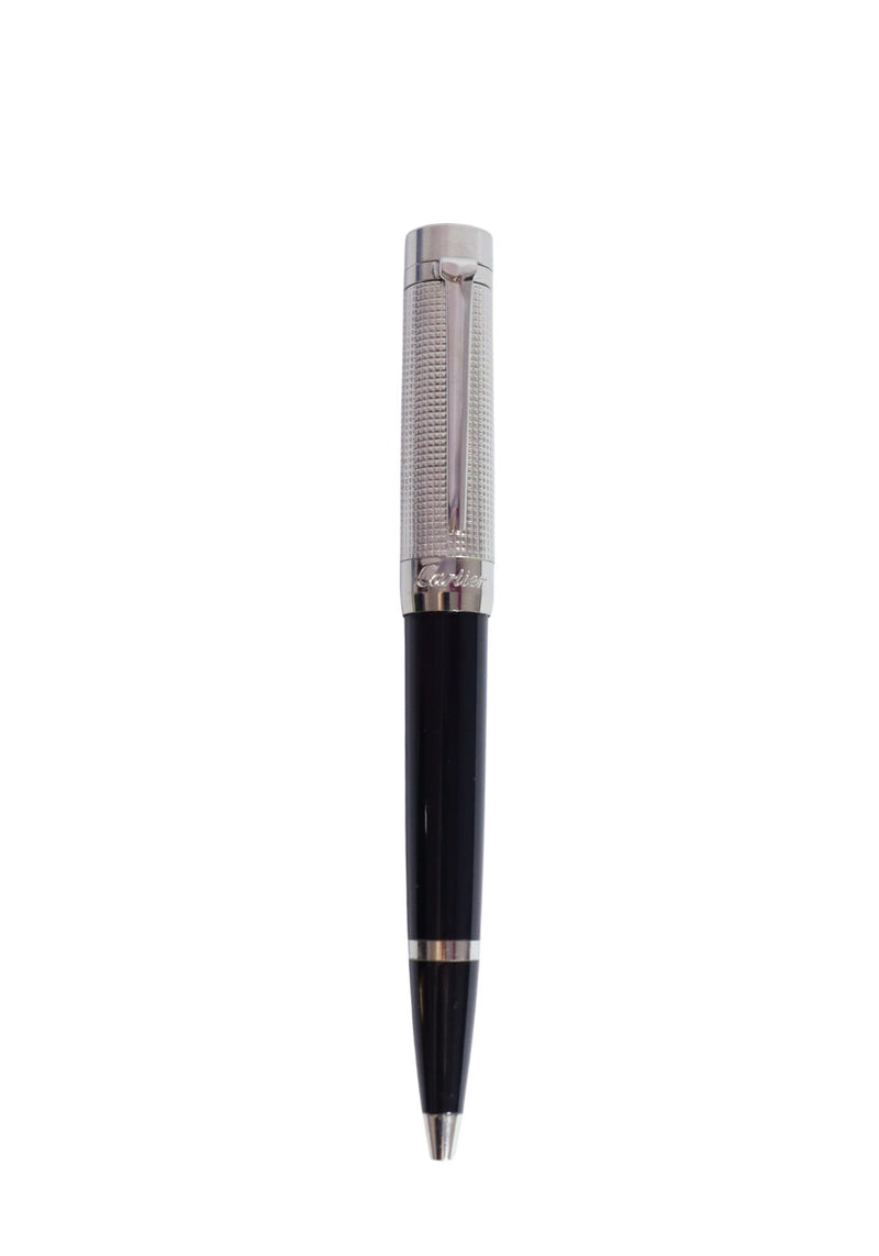 Cartier Santos-Dumont ballpoint pen with textured palladium-finish grip, black lacquer barrel, and silver-tone clip.