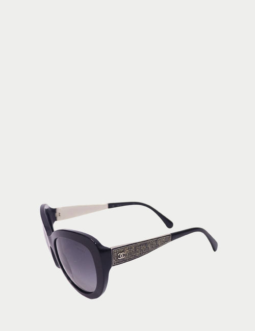 Chanel black oval sunglasses with gradient lenses, textured silver-tone arms, and signature CC logo detail
