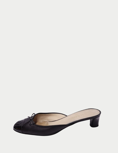 Chanel black leather mules with patent CC cap toe and low heel