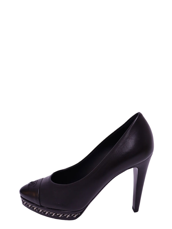 Chanel black leather platform pumps with embroidered CC logo and silver-tone chain trim