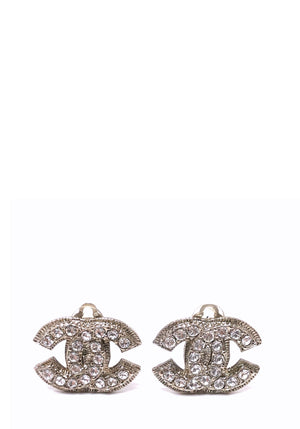 Chanel silver-tone crystal CC clip-on earrings with sparkling rhinestone embellishments.