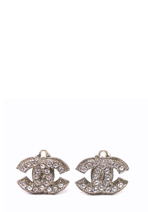 Chanel silver-tone crystal CC clip-on earrings with sparkling rhinestone embellishments.