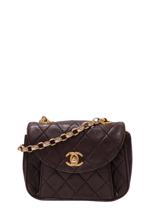 Chanel dark chocolate brown quilted leather mini flap handbag with rounded flap, gold-tone CC turn-lock and leather-interwoven chain strap