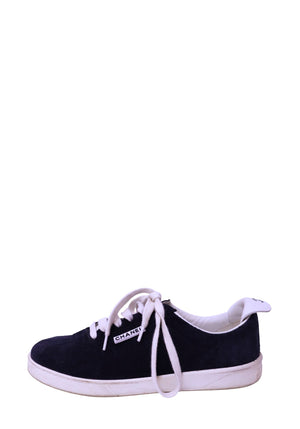 Chanel navy suede low-top sneakers with white laces and white rubber sole