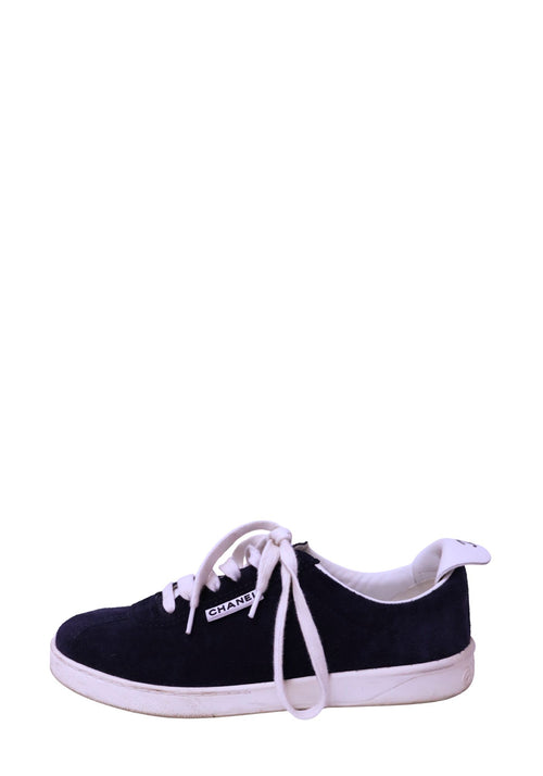 Chanel navy suede low-top sneakers with white laces and white rubber sole
