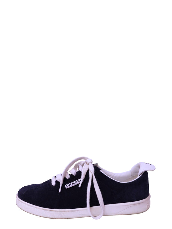 Chanel navy suede low-top sneakers with white laces and white rubber sole