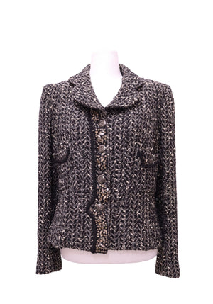 Chanel black and ivory embellished tweed jacket with decorative buttons and four patch pockets