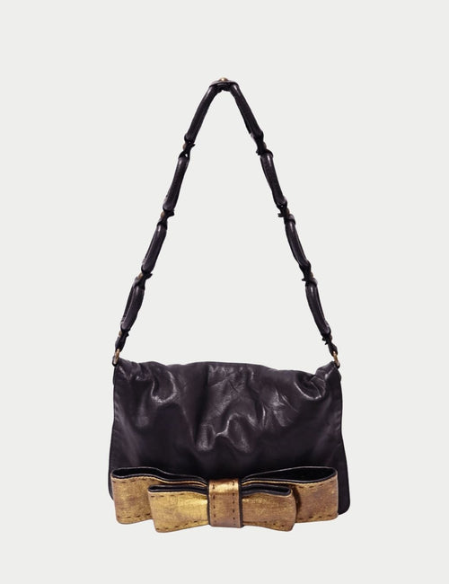 Chloé black leather shoulder bag with gold metallic bow detail