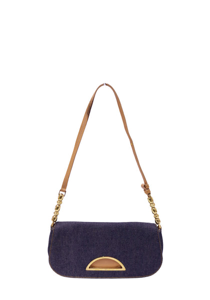 Christian Dior indigo denim shoulder bag with tan leather trim, adjustable shoulder strap, and gold-tone hardware