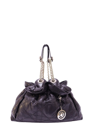 Authentic Christian Dior Le Trente black Cannage lambskin shoulder bag with silver-tone chain handles and CD charm.