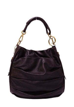 Christian Dior dark brown leather hobo bag with gold-tone CD hardware, leather-wrapped shoulder handle, and a soft slouchy silhouette