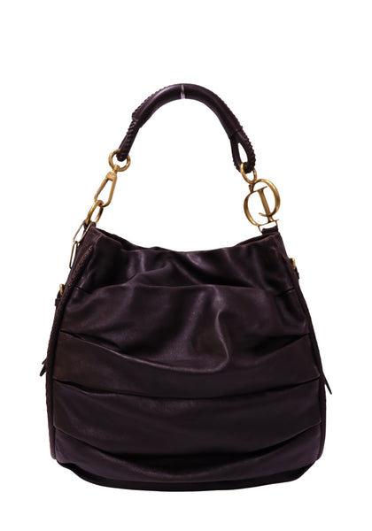 Christian Dior dark brown leather hobo bag with gold-tone CD hardware, leather-wrapped shoulder handle, and a soft slouchy silhouette