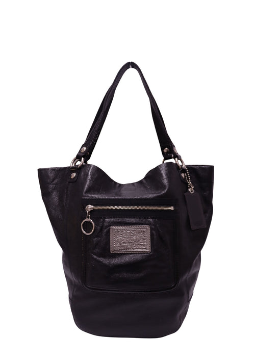 Coach Poppy black leather shoulder tote bag featuring a front zip pocket, embossed logo patch, silver-tone hardware, double leather straps and hanging leather tag