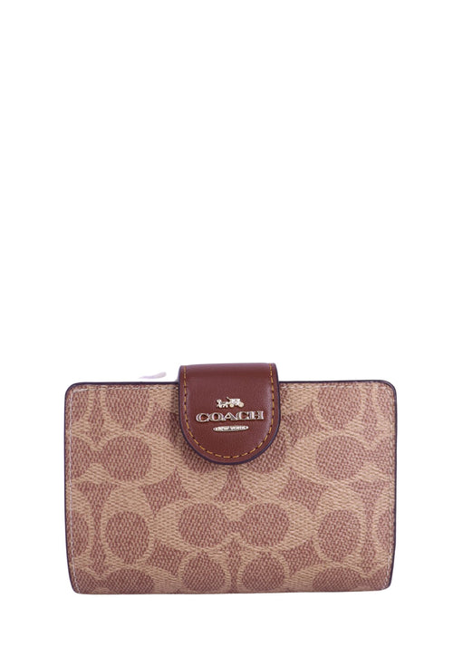 Coach brown and tan signature canvas wallet with leather trim and snap closure